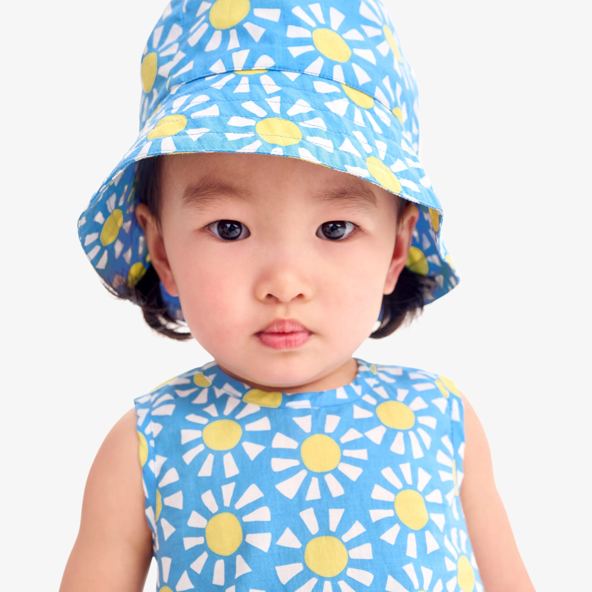 Baby bucket hat in cutout suns